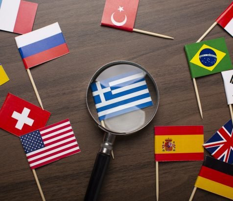 close-up-small-greece-flag-magnifying-glass